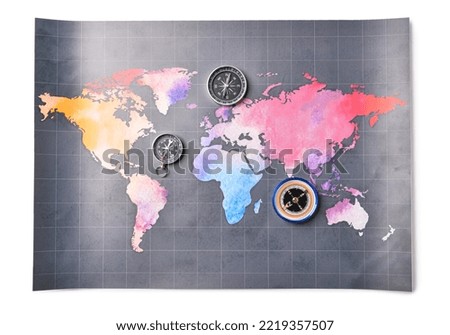 Vintage compasses and world map on white background