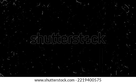 Dust and scratches damaged film surface. Grunge texture. Retro vintage effect on black background. Royalty-Free Stock Photo #2219400575