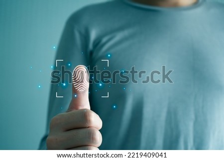 Fingerprint scanning and biometric authentication, cybersecurity and fingerprint password, Future Technology. Business Technology Safety Internet Network Concept. Royalty-Free Stock Photo #2219409041