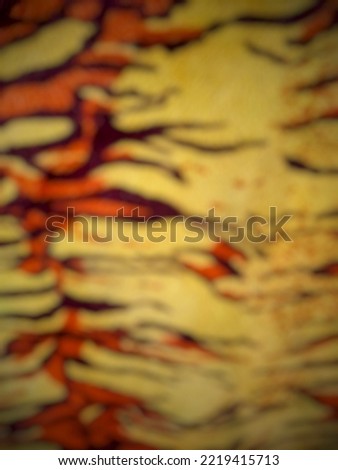 defocused background abstract of tiger skin texture 