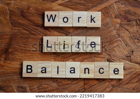 Work Life balance text on wooden square, business and motivation quotes