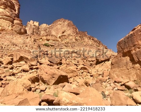 Wadi Rum, Jordan, November 2019 - A canyon with a mountain in the background