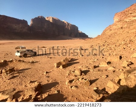 Wadi Rum, Jordan, November 2019 - A group of people on a rocky beach