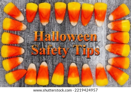 Halloween Safety Tips greeting with orange and yellow candy corn 