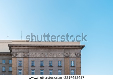 Corner of the building of Provincial Office (Urzad Wojewodzki) in Katowice, Silesia, Poland. Modernistic and classicist architecture. Facade finished with sandstone. Ornamental relief.