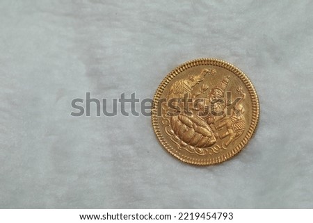Golden coins of Goddess Lakshmi, Laxmi for Dhanteras puja diwali festival Royalty-Free Stock Photo #2219454793