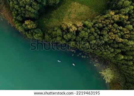 Aerial view of Masurian lake - August 2020, Poland Royalty-Free Stock Photo #2219463195