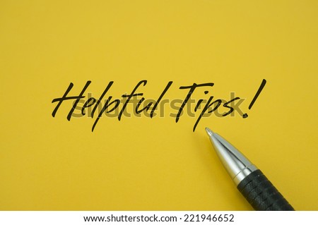 Helpful Tips! note with pen on yellow background