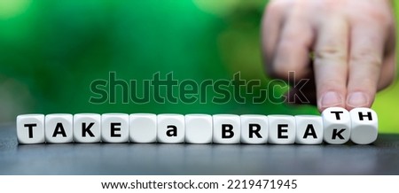 Dice form the expressions 'take a break' and 'take a breath'. Royalty-Free Stock Photo #2219471945