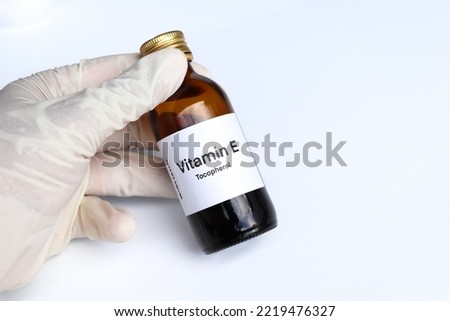 Vitamin E pills in a bottle, food supplement for health or used to treat disease Royalty-Free Stock Photo #2219476327