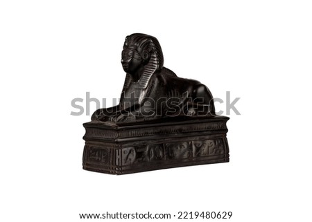 egyptian sphinx statue from black stone isolated on white background. High quality photo