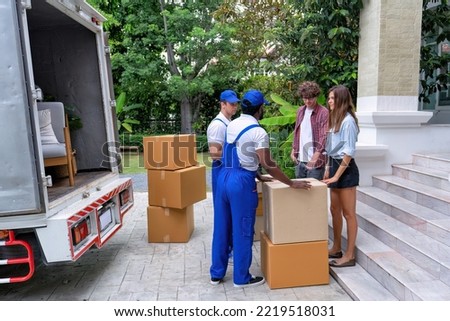 Professional goods move service use truck carry personal belongings door to door transport delivery handover boxes luggage one by one and keep stack on the floor the owner inspection and signature