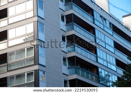 Facades of modern buildings. glass, metal, reflections, design, symmetry, modern architecture.