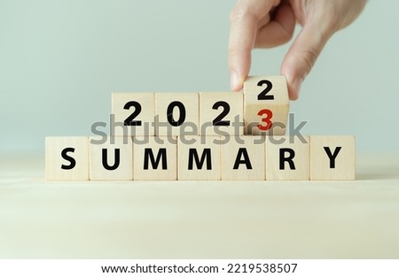 2022 year summary text on wooden cube blocks on smart grey background. Past performance analysis for learning and  improvement. Preparation for annual plan in 2023. End of year concept. Royalty-Free Stock Photo #2219538507