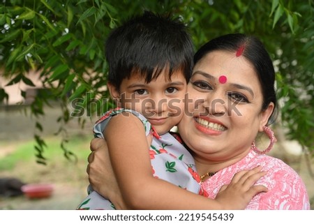 Loving mother and daughter at village