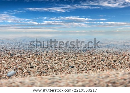 beautiful sandy beach on the background of a sunny sky