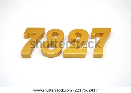   Number 7827 is made of gold-painted teak, 1 centimeter thick, placed on a white background to visualize it in 3D.                                