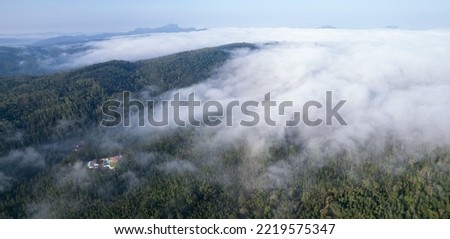 Aerial Landscape Photography of mountaisn and clouds