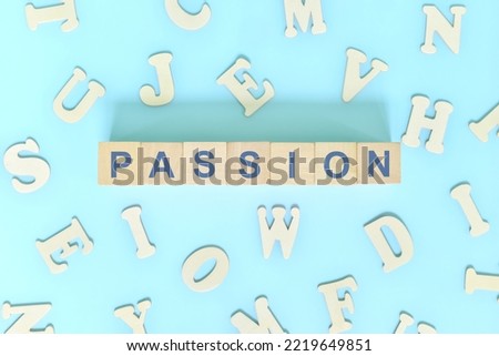 Passion core values concept in business, company and organization. Word typography on wooden blocks flat lay.