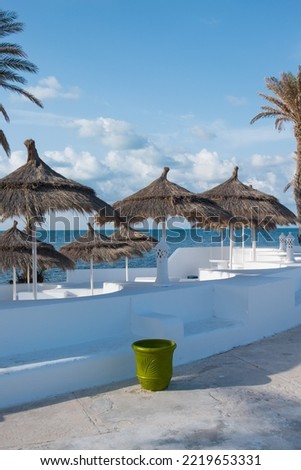 A cafe in front of the beach from the island of Djerba, Tunisia on summer photo taken on September 2022