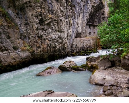 View of the Dorea Baltea River in Pre-Saint-Didier, Aosta Valley, north Italy Royalty-Free Stock Photo #2219658999