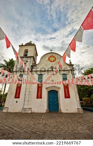 Matriz de Santanna Church, in Itanhaem, south coast of Sao Paulo, decorated with white and red flags typical of the June Festivals. Brazil