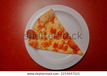 Delicious tomato sauce cheese covered hot and tasty buffalo chicken pizza pie  Royalty-Free Stock Photo #2219697521