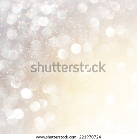 white silver and gold abstract bokeh lights. defocused background 