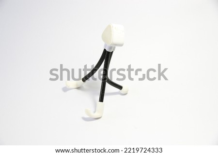 black phone stand on white background
