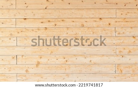 Natural wood background with horizontal lines.