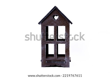 Houses symbol with metal key on on white background. Real estate, insurance concept, buy sell house, realtor concept. Isolated, wooden houses, new life. housewarming, lock and keychain little cars
