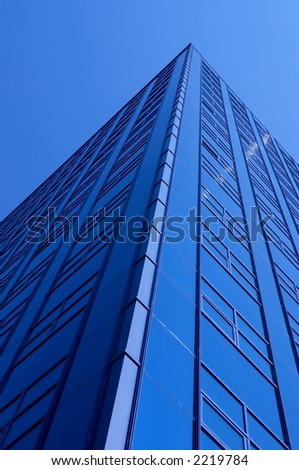 Blue building and a nice blue sky.