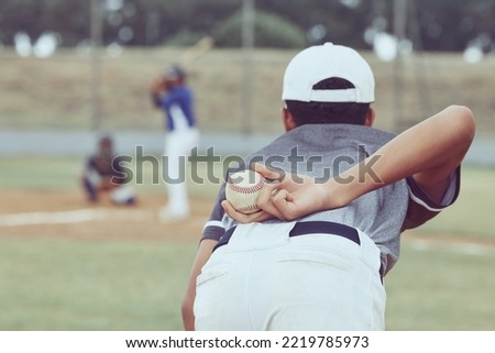 Baseball, pitcher and ball in hand, player ready to pitch and young men playing on field. Sports, fitness and professional baseball player in uniform with baseball bat waiting on diamond to win game.