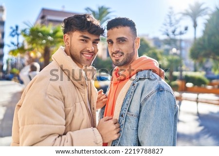 Two man couple standing together at street Royalty-Free Stock Photo #2219788827