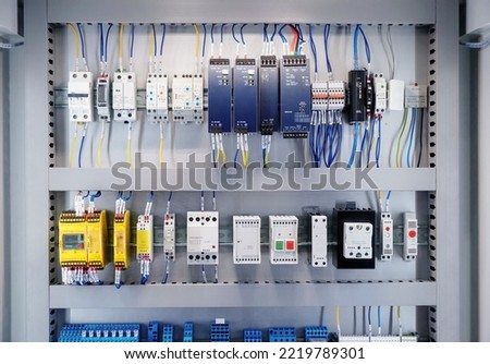 Electric control panel open enclosure for automatic circuit system, electrical voltage, industrial electric.                          Royalty-Free Stock Photo #2219789301