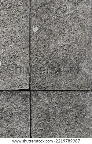 Weathered pavement tiles with copy space and gray stone concrete Texture. Texture and Pattern for industrial background.