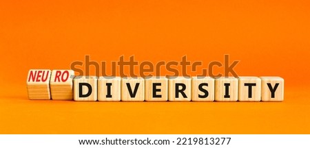 Diversity or neurodiversity symbol. Concept words Diversity and Neurodiversity on wooden cubes. Beautiful orange table orange background. Medical diversity or neurodiversity concept. Copy space.