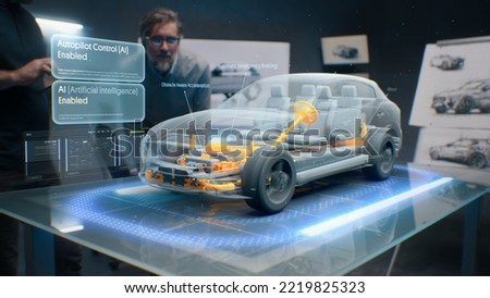 Development engineers are testing driverless autopilot system integrated into an electric car with AI artificial intelligence. They use innovative cutting edge 3D modeling technology of visualisation