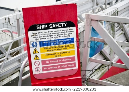 Ship safety sign at gate for passengers boarding