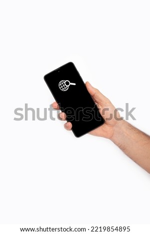 hand holding mobile phone on white background