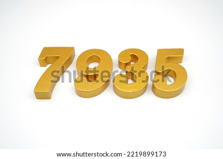   Number 7935 is made of gold-painted teak, 1 centimeter thick, placed on a white background to visualize it in 3D.                                  