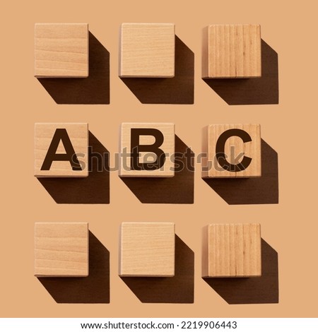 ABC letters on cubes on wood table. High quality photo