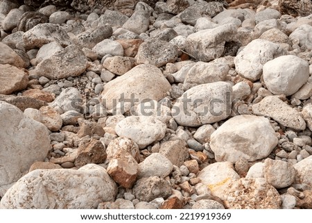 Stoney background, close-up. Stone landscape. Big pebbles for publication, poster, calendar, post, screensaver, wallpaper, post, card, banner, cover, website. High quality photography