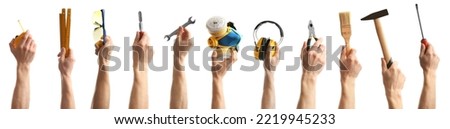 Collage with photos of men holding different construction tools on white background, closeup. Banner design Royalty-Free Stock Photo #2219945233
