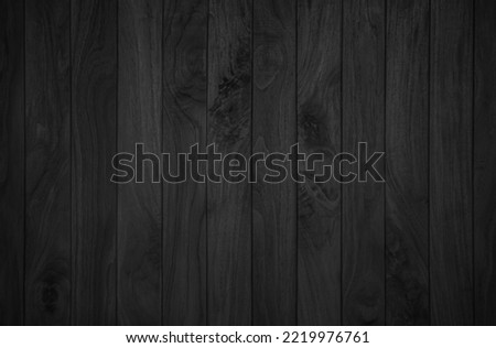 Dark wood texture background. Vintage old black boards hardwood. Charcoal timber quality high. Pattern wood grain material polished. Wooden floor detailed photo.
