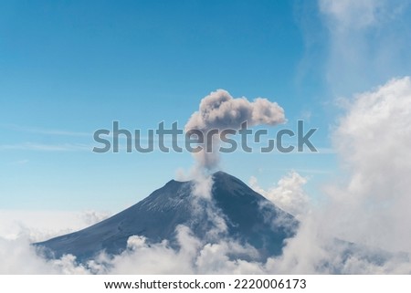 Smoking Popocatepetl volcano in Mexico