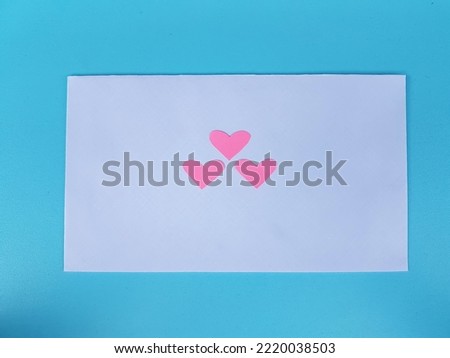 White envelope and symbol of love.