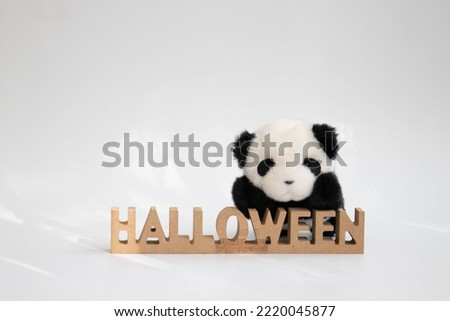 Panda Plush Doll with Wooden Halloween Signage