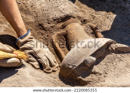 Vetren, Bulgaria - August, 18 2022: Archaeologists are working at Emporion Pistiros excavation site. Royalty-Free Stock Photo #2220085355