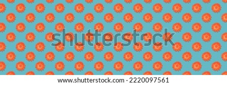Horizontal banner of seamless pattern of red flowers isolated on blue background.